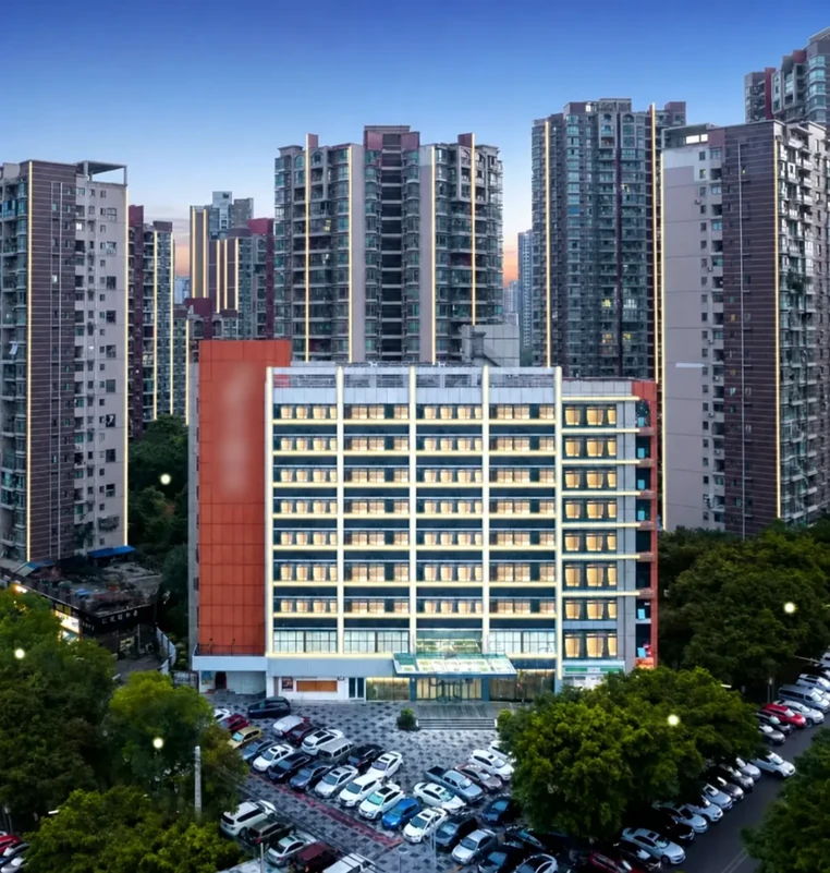 Exterior of the Chongqing hotel project with identifying signage blurred