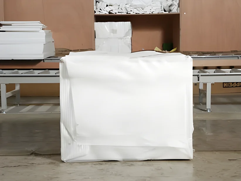 Tightly wrap the cabinet wholly with stretch film.